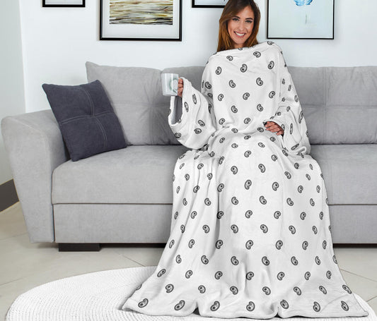 white sleeved blanket with black paisley