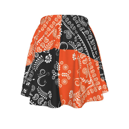 Skirt with orange and black paisley pattern on a white background