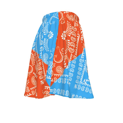 A orange and light blue skirt with a paisley bandana motif on a white background.
