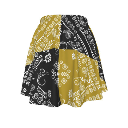 Skirt with black, gold, and white paisley pattern on a white background