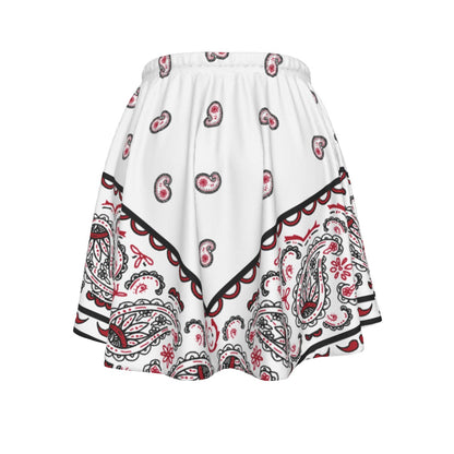 White skirt with red and black paisley pattern on a white background