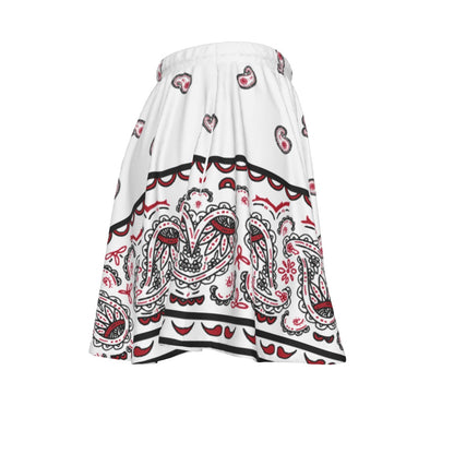 White skirt with red and black pattern on a white background