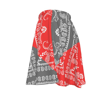 A red and grey paisley motif bandana skirt on a white background.