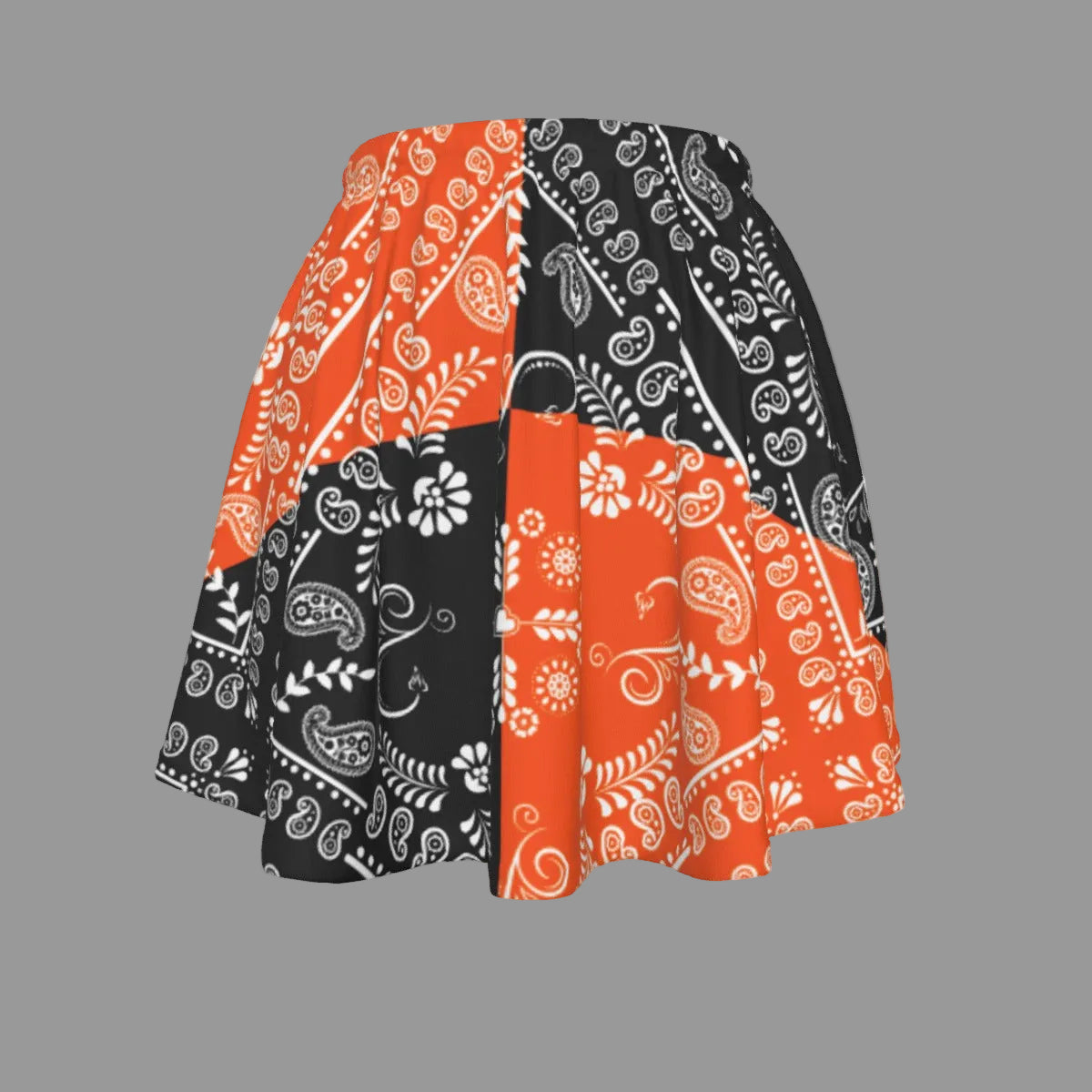 Skirt with orange and black paisley pattern on a white background