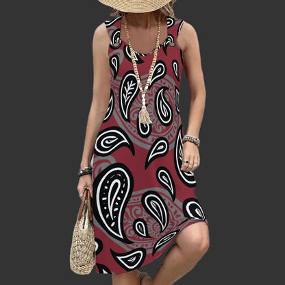 Women in a Maroon Paisley Dress Leaning on a wall