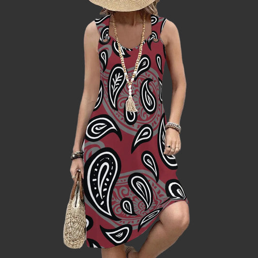 Women in a Maroon Paisley Dress Leaning on a wall