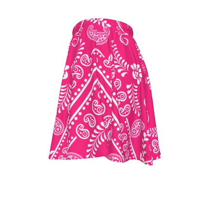 Pink skirt with white paisley pattern on a white background