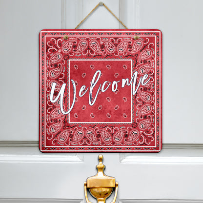 welcome red door sign