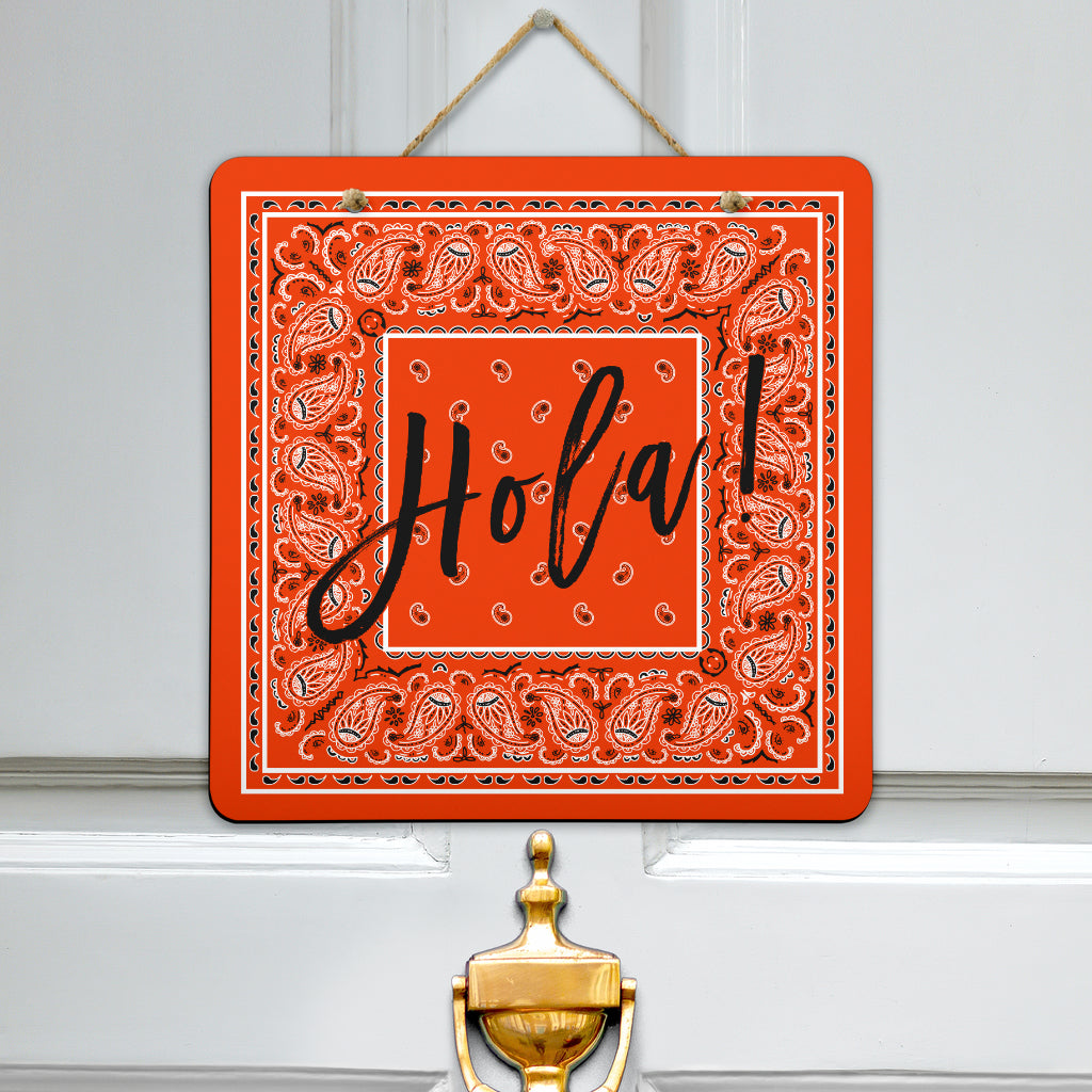 orange bandana hola door sign