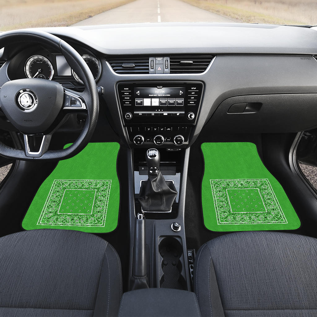 green automobile floor mats