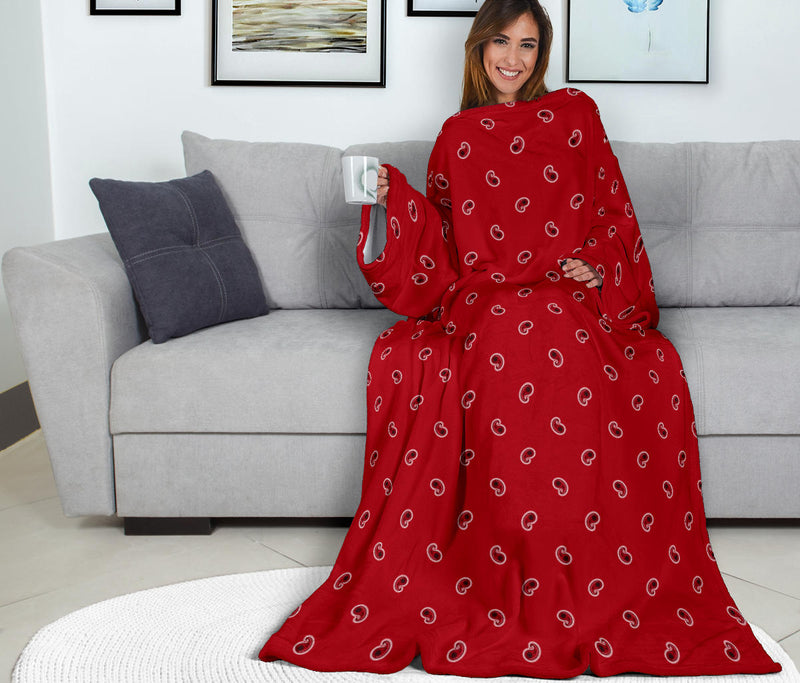 red paisley patterned sleeved blanket