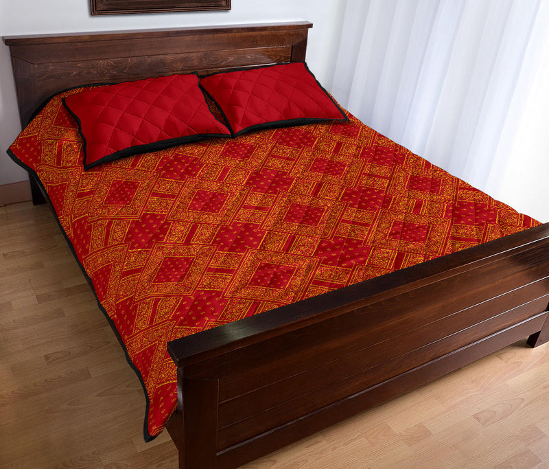 red and yellow bed quilt